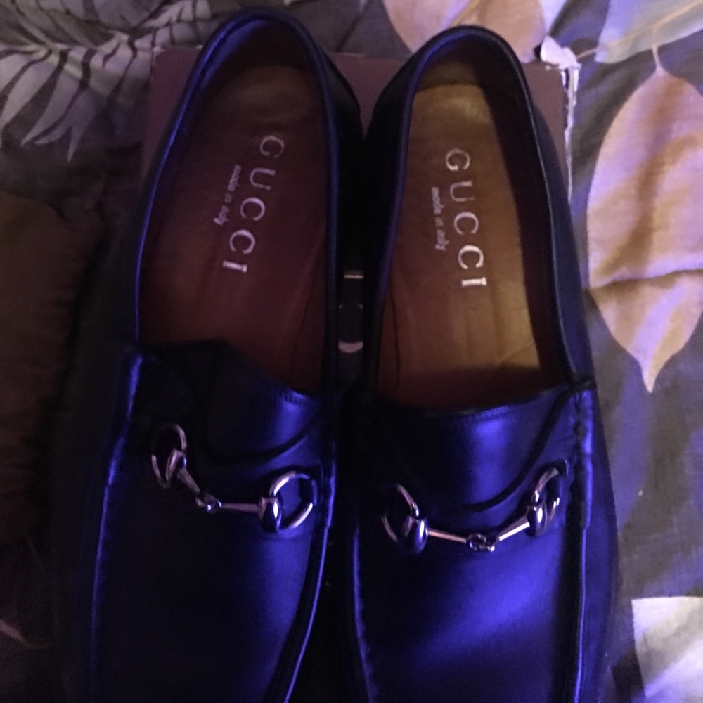 Black Gucci leather loafers